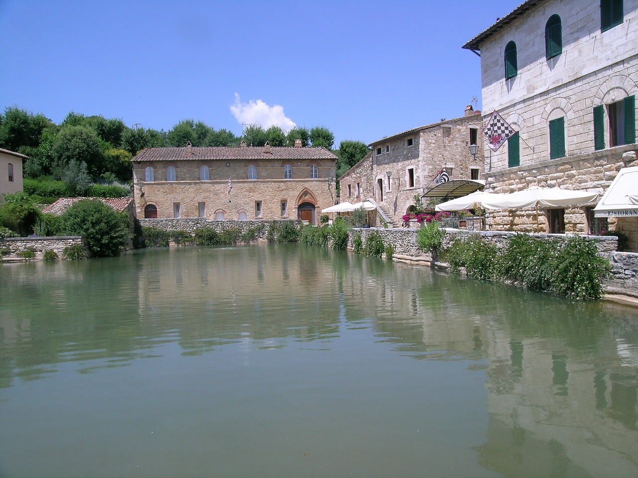 Bagno Vignoni is unique right off the bat. What in other villages is a central square, is here a pool, or a bath, as the Romans would say. Olympic-sized.